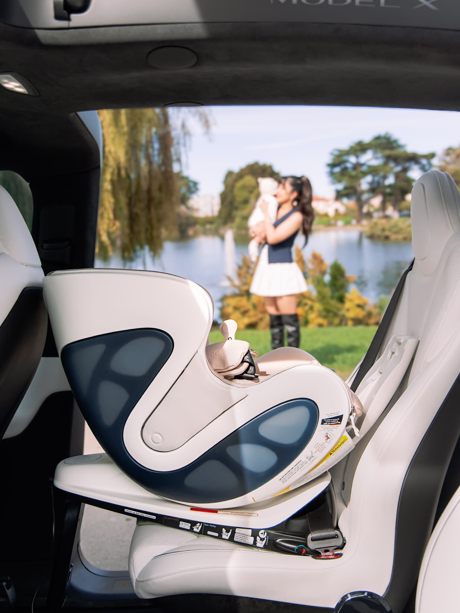 Babyark car seat shown in a family lifestyle setting