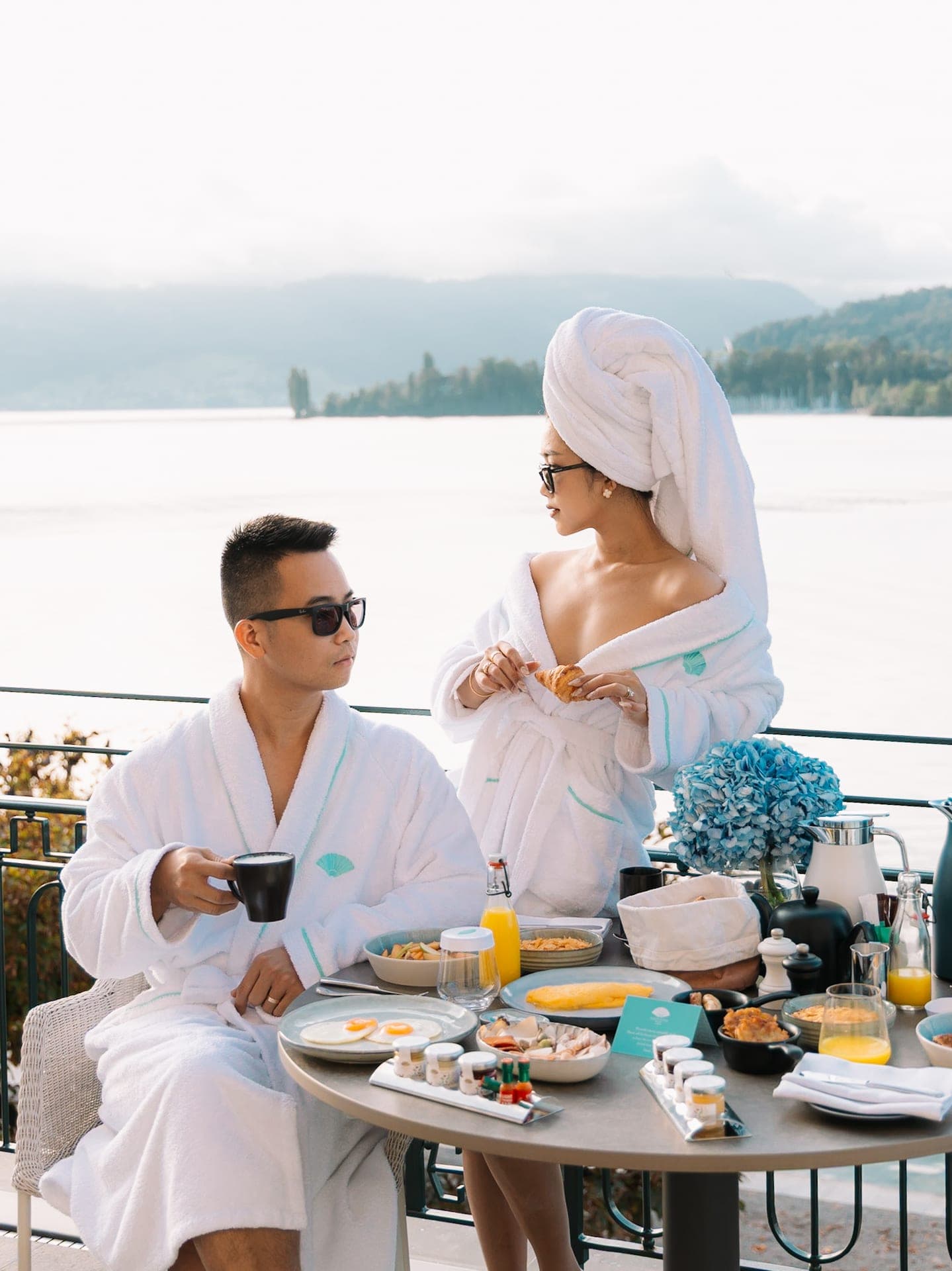 Editorial photography of lakeside terrace dining at Mandarin Oriental Lucerne