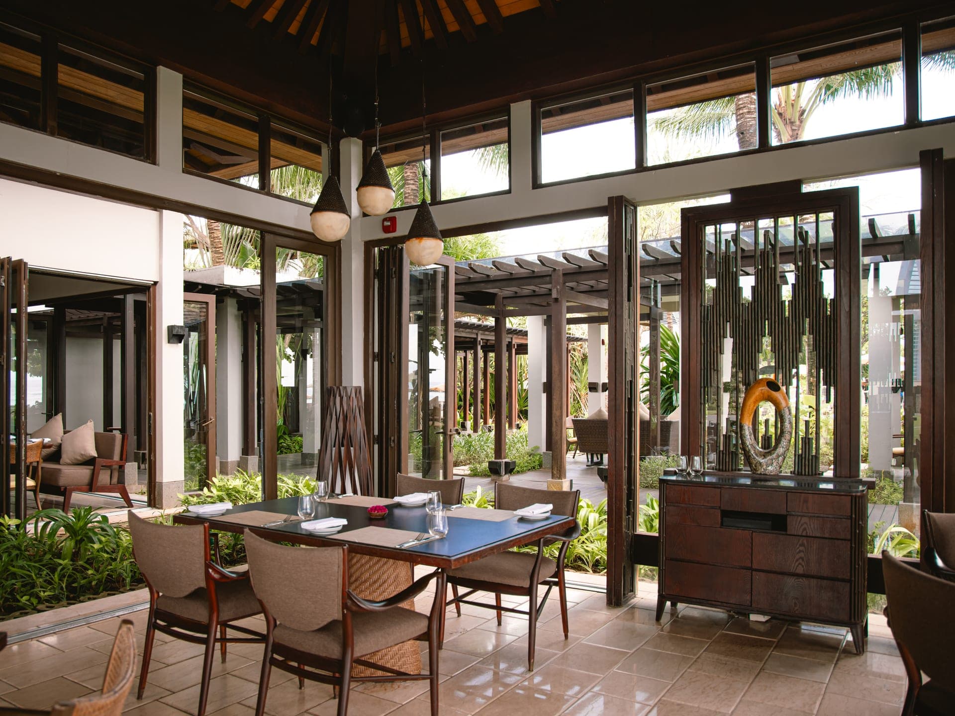 Poolside pavilion dining at The Ritz-Carlton Bali
