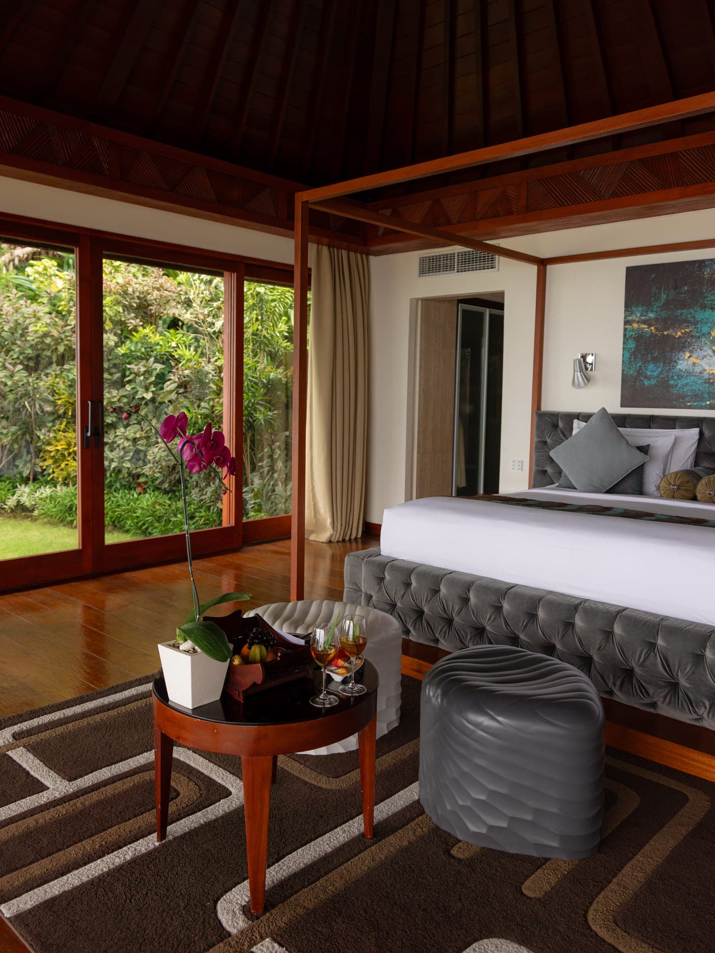 Villa bedroom opening to jungle views at The Edge Bali, the editorial standard Lumière Pixel works to
